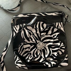 CROSSBODY-brand new-Purse black & white embellished w/ zebra accents and jewels.